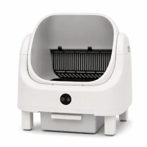 Litière automatique compacte blanche pour chat avec bac à déchets amovible, idéale pour les petits appartements.