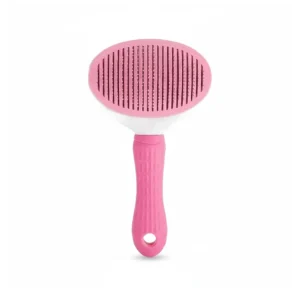 Brosse de toilettage rose à manche rose, vue de face sur fond blanc