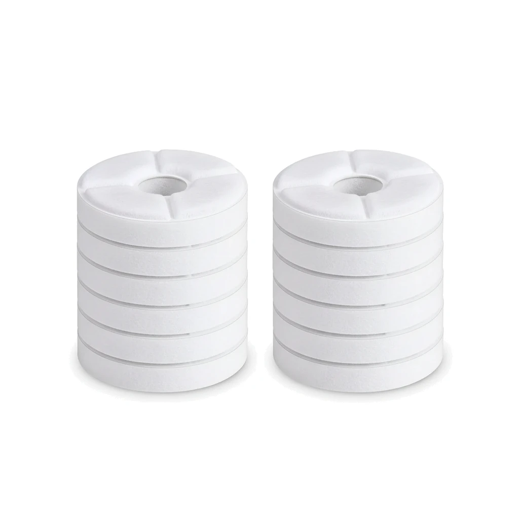 Deux piles de disques de filtre blancs, vue de côté